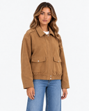 Another view of the Khaki Avery suede-effect jacket on a model.