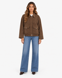 Avery pocket jacket in Brown, showing its easy, relaxed shape.