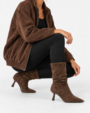 Celestine dark brown boots, worn view showing the boot shafts.