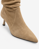 Celestine apricot boots, close-up of the ankle and gathered shaft.