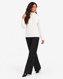 Harriet White cable-knit roll-neck jumper, full-length styling with black wide-leg trousers