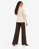 Harriet Apricot cable-knit roll-neck jumper, back view showing the cable-knit pattern