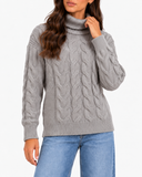 Harriet Grey cable-knit roll-neck jumper, close-up front view showing the roll neck and cable-knit pattern