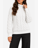 Harriet White cable-knit roll-neck jumper, close-up front view showing the roll neck and cable-knit pattern