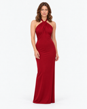 Woman wearing the Isolde red halter maxi dress, full-length front view