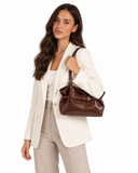 Maren brown buckle shoulder bag, carried on the shoulder