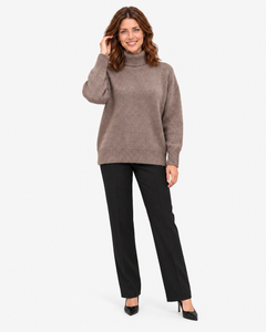 Naomi brown roll-neck jumper, full-length front pose