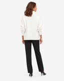 Naomi white roll-neck jumper, full-length back view