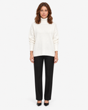 Naomi white roll-neck jumper, full-length front view