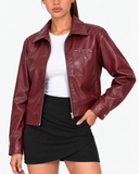 Close-up front view of the Solange red faux leather biker jacket