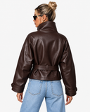 Back view of Veda dark brown faux leather jacket showing belt and raglan sleeves