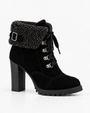 Romina black boots, side view showing the platform sole and lace-up front.
