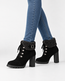 Romina black boots, worn with jeans.