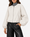 Aveline Beige zip-up baseball jacket, close-up of zip and pocket