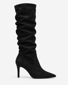 Ines black boots, side view showing the pointed toe and stiletto heel.