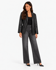 Mariette black leather-effect blazer with dark grey wide-leg jeans, full-length three-quarter view