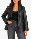 Close-up of Mariette black blazer showing the lapels, single button and flap pockets