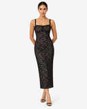 Front view of a model wearing the Celina black floral lace dress