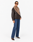 Elowen brown faux fur-collar jacket, three-quarter view styled with wide-leg jeans