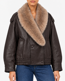Close-up of the Elowen brown jacket showing the faux fur collar, button front and gathered hem