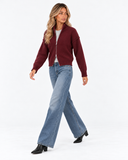 Estelle High Neck Zip Cardigan in dark red – side walking view