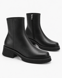 Alba black boots, pair viewed at an angle with the side zip visible.