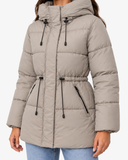 Close-up of the Iselle khaki coat showing quilted panels and zipped pockets