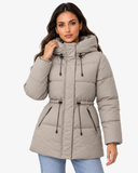 Front view of the Iselle khaki hooded coat with one hand raised