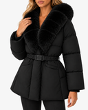 Close-up of the black Nerina coat showing the faux fur collar, belt buckle and padded sleeve