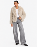 Noeline faux-fur jacket in Beige Apricot, front view styled with a white T-shirt and grey jeans