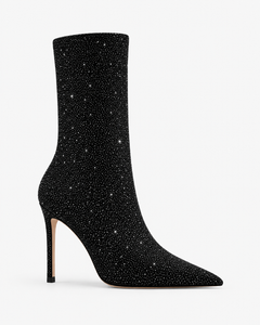 Ophelia black boots, side view showing the pointed toe and stiletto heel.