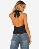 Alternate view of a model wearing the Roselle black satin halter top