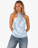 Model wearing the Roselle sky blue satin halter top