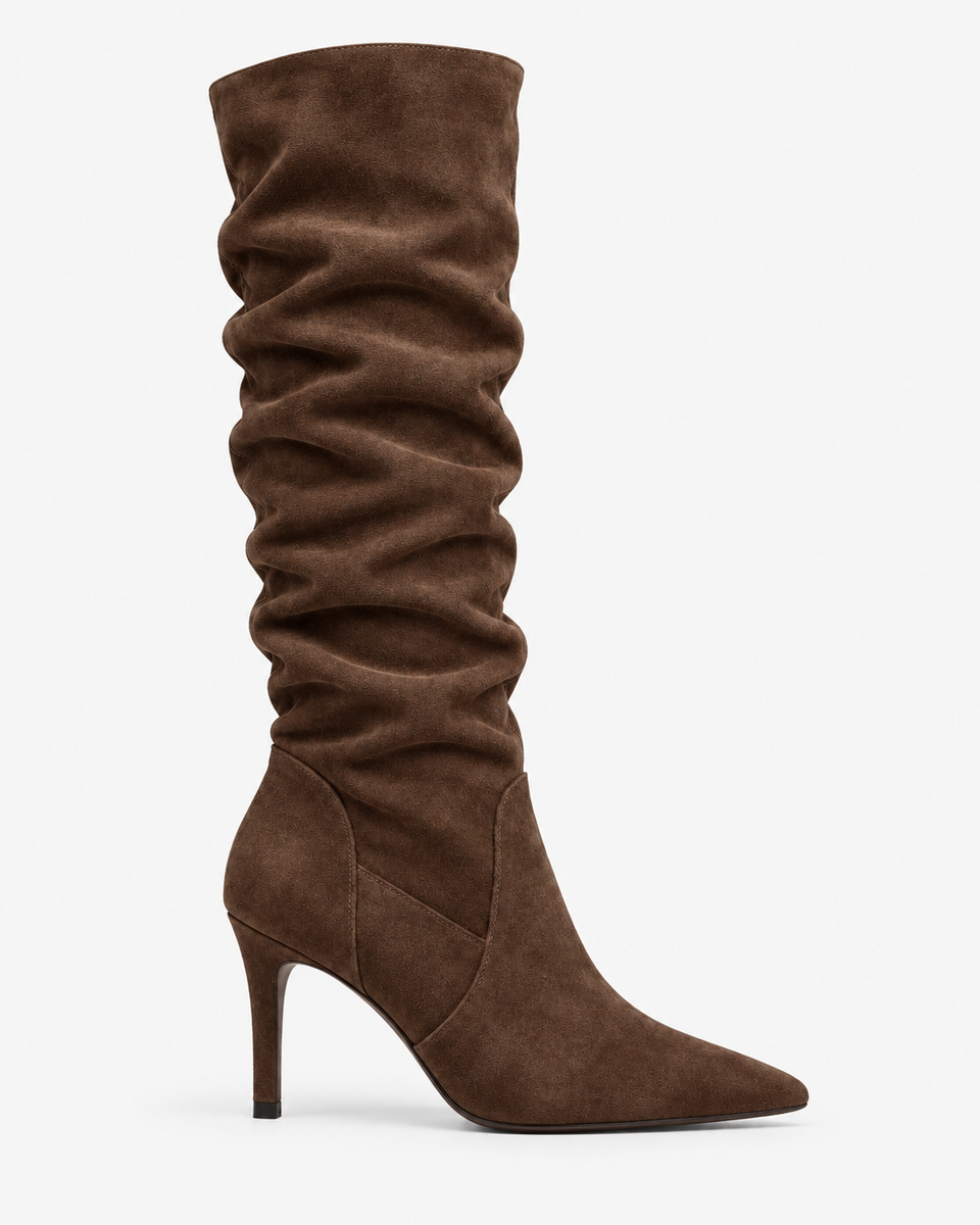 Ines coffee boots, side view showing the pointed toe and stiletto heel.