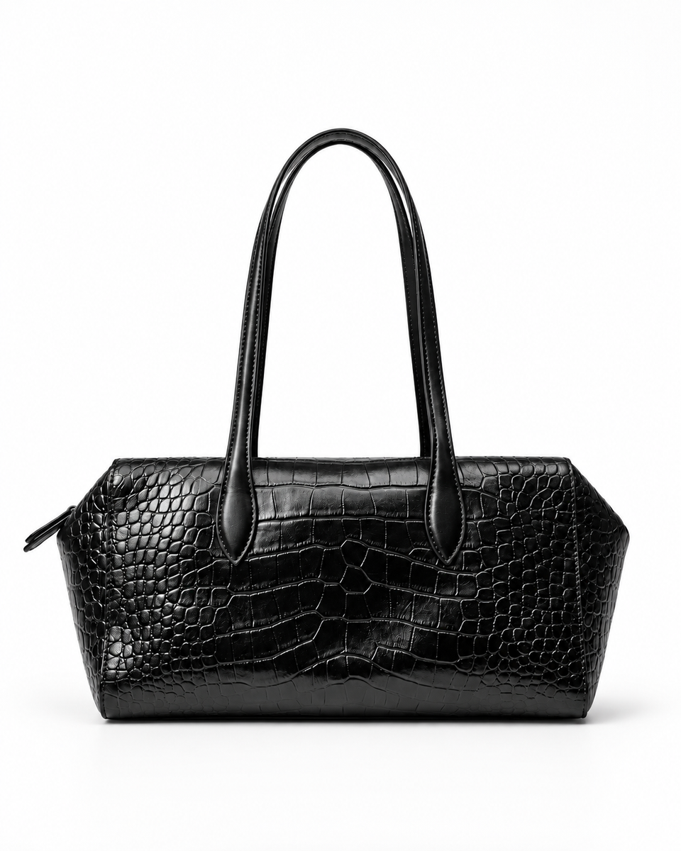 Front view of a black crocodile-pattern tote bag with twin handles on a white background.