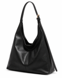 Black faux leather shoulder bag shown at an angle with its single strap visible.