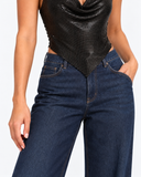 Close-up of the pointed hem and chainmail-style texture of the Aurelie black chainmail halter top.