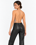 Back view showing the open back of the Aurelie silver chainmail halter top.